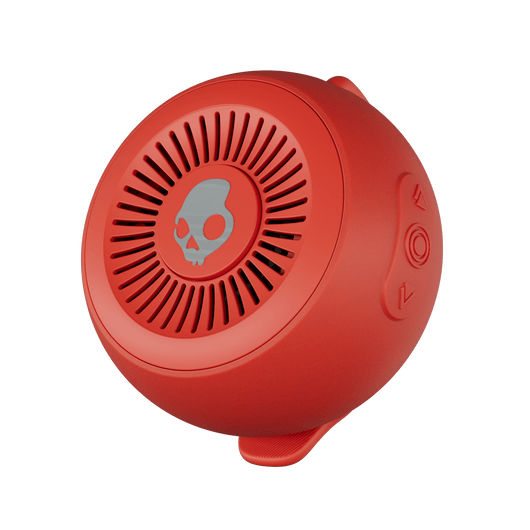 Red portable speaker with a skull design on a black background | Plasma